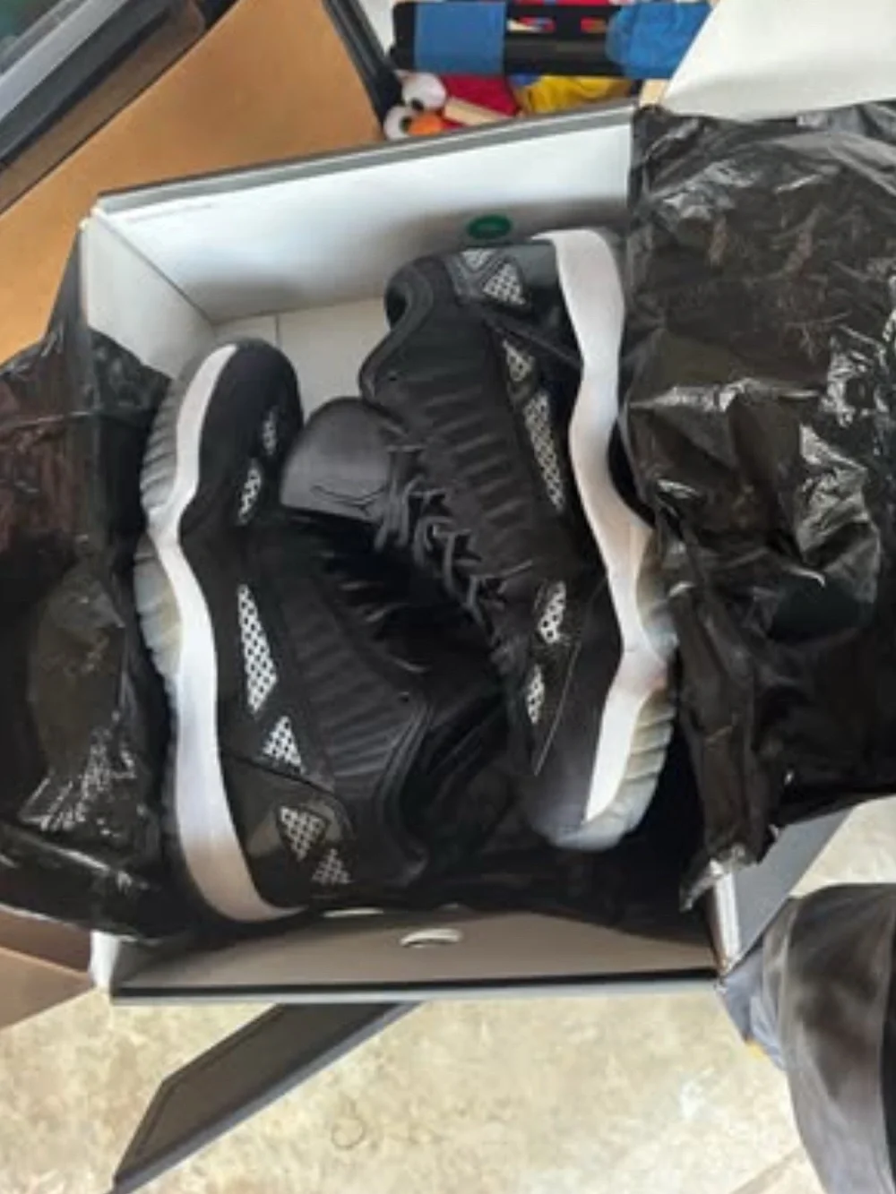 Jordan Retro Low IE Sneakers in Black and White